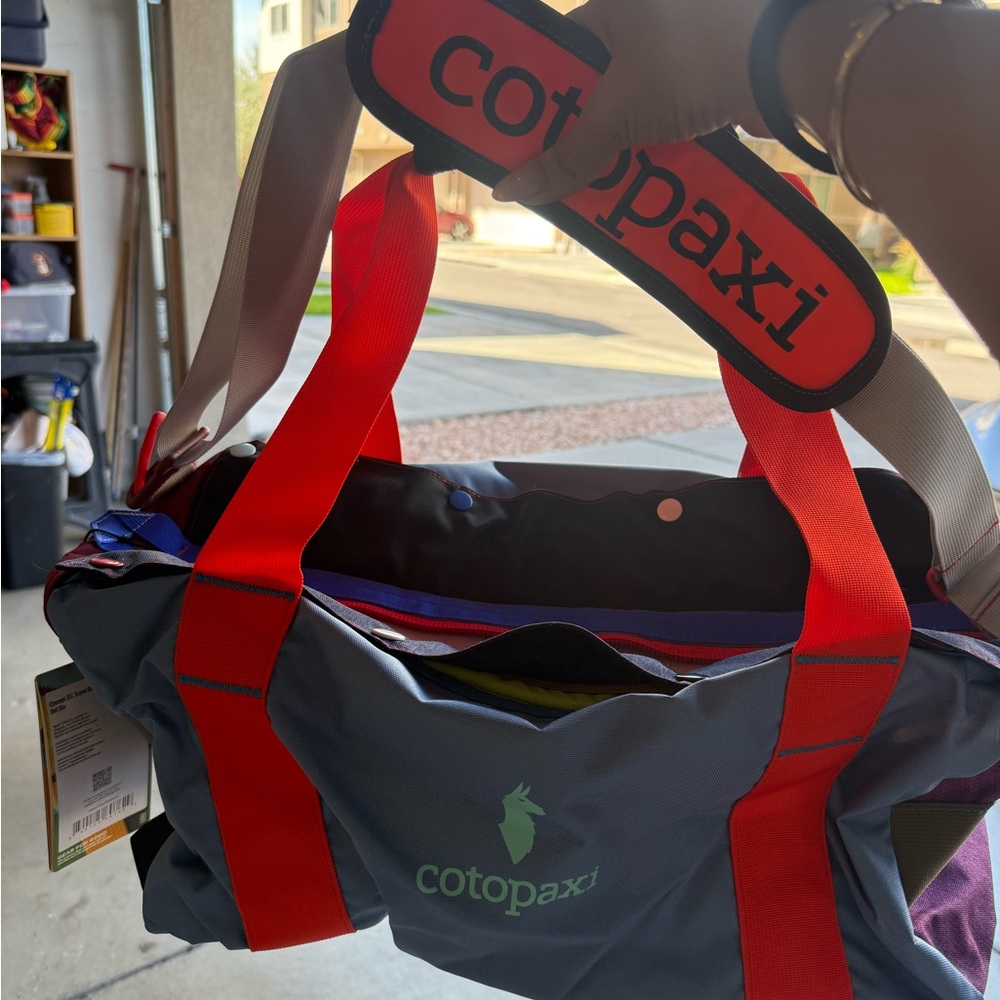 Cotopaxi Duffel Bag with Red and Gray Design